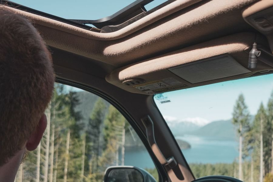 Sunroof sedan interior with panoramic glass roof